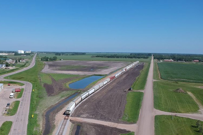 Hopper cars near the mill in 2022. Photo by Trent Berg, Houston Engineering, Inc.